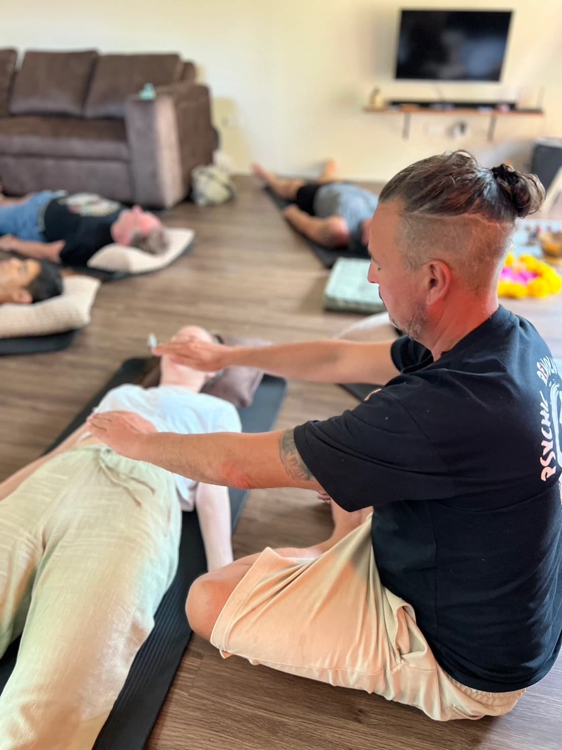 Master Andy leading a Reiki energy healing session at Zen Pod